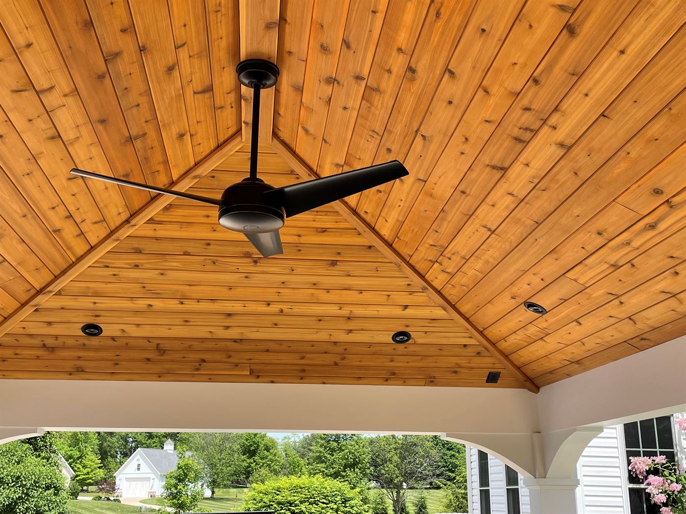Covered porch addition with cedar cathedral ceiling by Stellar Construction in Northeast Ohio